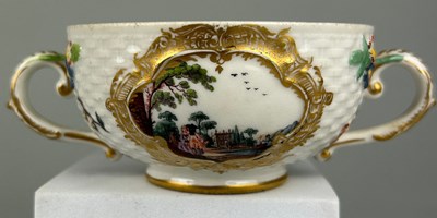 Lot 172 - A MEISSEN PORCELAIN TWIN HANDLED CHOCOLATE CUP...