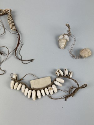 Lot 454 - A COLLECTION OF ORNAMENTS WORN BY THE NATIVES...