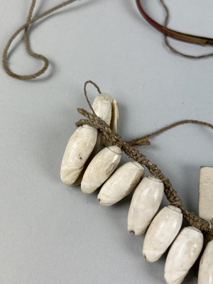 Lot 454 - A COLLECTION OF ORNAMENTS WORN BY THE NATIVES...