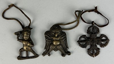 Lot 246 - A SET OF THREE TIBETAN PENDANTS (3)