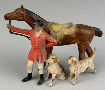 Lot 252 - A HEYDE HUNTSMAN COLD PAINTED HUNTING GROUP,...