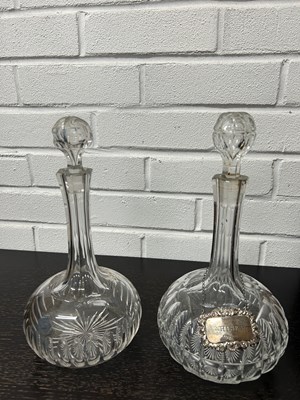 Lot 267 - A NEAR PAIR OF GLASS DECANTERS, one with...