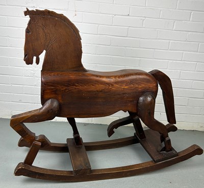 Lot 302 - A 19TH CENTURY ROCKING HORSE FROM NUREMBERG IN...