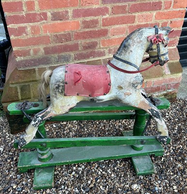 Lot 303 - A VINTAGE ROCKING HORSE OF SMALL...