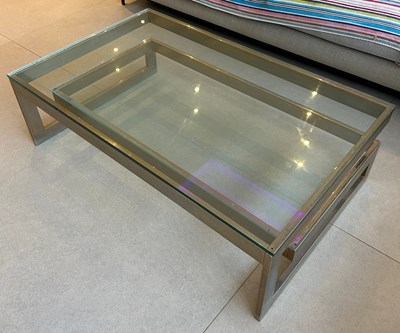 Lot 330 - A DESIGNER RECTANGULAR TWO TIER GLASS TABLE...