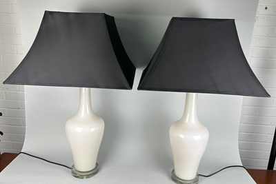 Lot 358 - A PAIR OF TALL WHITE TABLE LAMPS WITH BLACK...