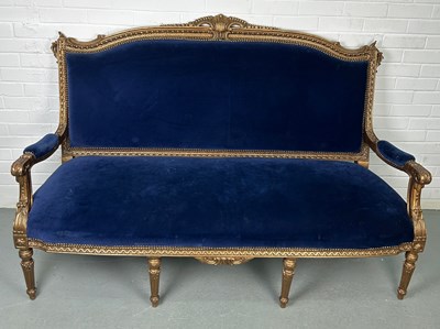 Lot 361 - A FRENCH GILTWOOD CANAPE UPHOLSTERED IN BLUE...