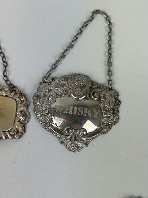 Lot 284 - A COLLECTION OF NINE SILVER BOTTLE LABELS TO INCLUDE BRANDY, WHISKEY, PORT, GIN, SHERRY (9)