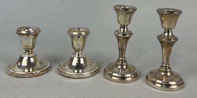 Lot 310 - TWO PAIRS OF SILVER CANDLESTICKS (4)