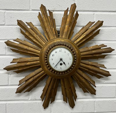 Lot 465 - A 20TH CENTURY SUNBURST WALL CLOCK BY JAPY...