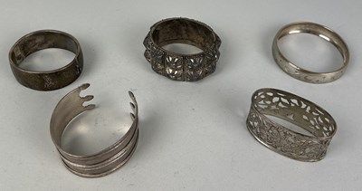 Lot 220 - A COLLECTION OF SILVER CUFF BANGLES (5)