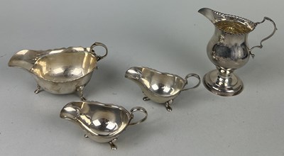 Lot 261 - THREE SILVER SAUCE BOATS AND A JUG (4)