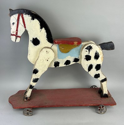 Lot 36 - AN ANTIQUE PAINTED WOODEN ROCKING HORSE,...