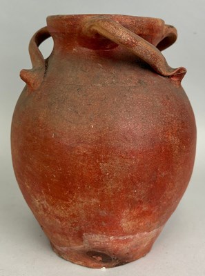 Lot 47 - A TERRACOTTA POT WITH UNUSUAL TWISTED HANDLES,...