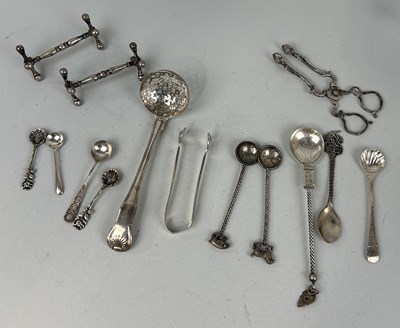 Lot 214 - A COLLECTION OF SILVER TO INCLUDE SPOONS, KNIFE RESTS, TONGS (QTY)