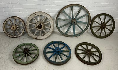 Lot 68 - A GROUP OF SEVEN ANTIQUE PAINTED CARTWHEELS,...