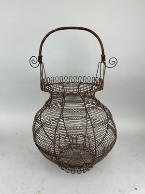 Lot 86 - A FRENCH WROUGHT IRON BASKET, 

57cm x 31cm