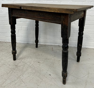 Lot 87 - A RUSTIC FRENCH PINE SIDE TABLE WITH EBONISED...