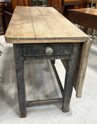 Lot 94A - A RUSTIC PINE GATE LEG TABLE WITH EBONISED...