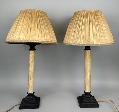 Lot 108 - A PAIR OF PAINTED WOODEN TABLE LAMPS ON BRONZE...