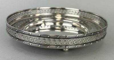 Lot 156 - A SILVER COASTER WITH PIERCED GREEK KEY BORDER,...