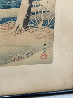 Lot 189 - A JAPANESE WOODBLOCK PRINT DEPICTING A WINTRY...