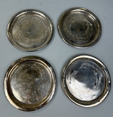 Lot 278 - A SET OF FOUR SILVER WINE COASTERS BY WALKER AND HALL (4)