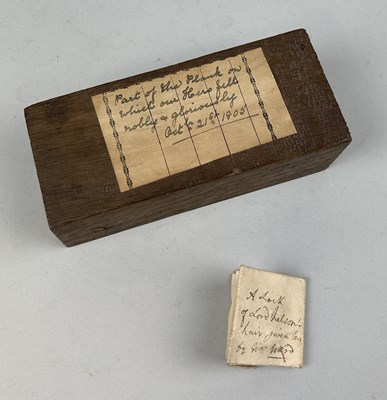 Lot 464 - LORD HORATIO NELSON INTERST: A LOCK OF HAIR BY REPUTE BELONGING TO LORD NELSON ALONG WITH PART OF THE PLANK OF WOOD ON WHICH NELSON FELL ON HMS VICTORY