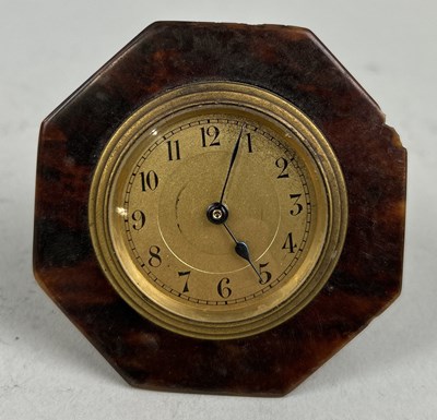 Lot 652 - AN OCTAGONAL TORTOISESHELL DESK CLOCK