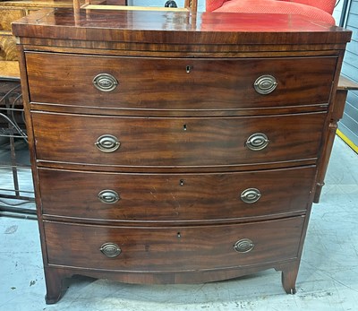 Lot 520 - A GEORGE III BOW FRONT CHEST OF...