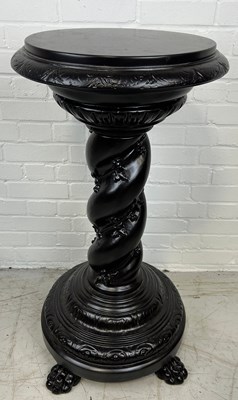 Lot 531 - A CLASSICAL DESIGN BLACK EBONISED PEDESTAL...