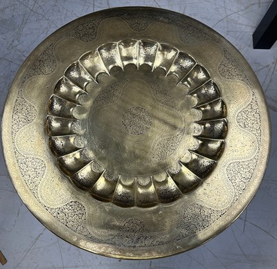 Lot 542 - A MOROCCAN BRASS TABLE WITH BRASS INLAID...