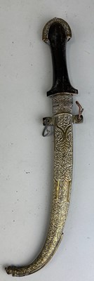 Lot 553 - A MIDDLE EASTERN JAMBIYA AND SCABBARD, 

42cm L