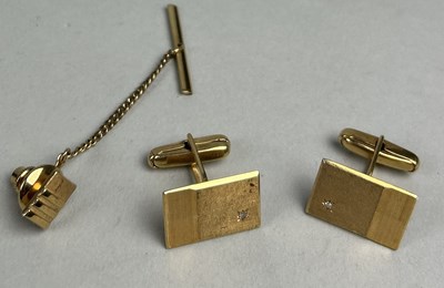 Lot 46 - A PAIR OF 14CT GOLD CUFFLINKS EACH SET WITH ONE SMALL DIAMOND