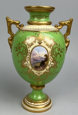 Lot 654 - A COALPORT PORCELAIN URN WITH CENTRAL PAINTED LANDSCAPE PANEL, GILT DETAIL ON PALE GREEN GROUND