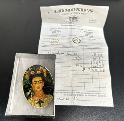 Lot 632A - A SILVER PENDANT PAINTED WITH FRIDA KAHLO