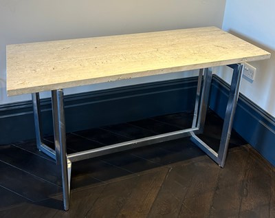 Lot 651 - A TRAVERTINE TABLE ON CHROME LEGS,

135cm x...