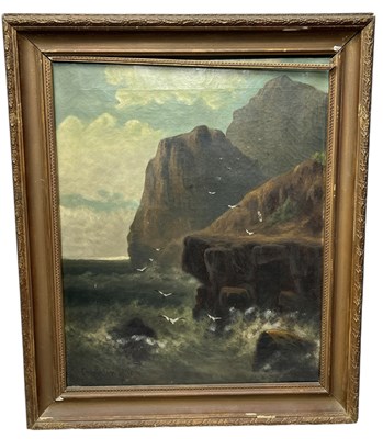 Lot 938 - AN ANTIQUE OIL PAINTING DEPICTING SEABIRDS IN FLIGHT NEAR CLIFFS