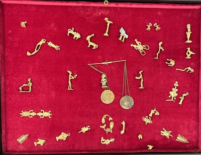 Lot 680 - A LARGE COLLECTION OF AFRICAN GOLD WEIGHTS,...