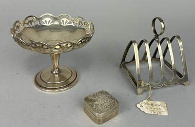 Lot 134 - A SILVER TOAST RACK ALONG WITH A PEDESTAL CUP...