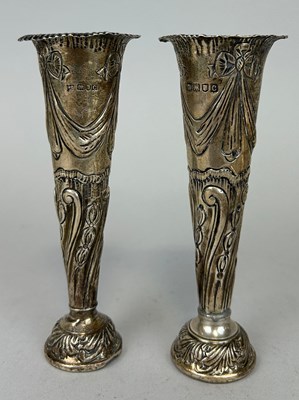 Lot 136 - A PAIR OF SILVER POSY VASES, 

Marked for...