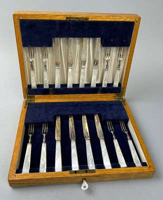 Lot 145 - A SILVER AND MOTHER OF PEARL CUTLERY SET...