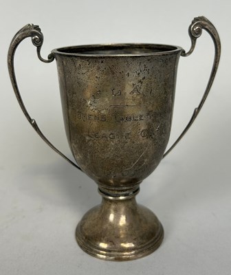 Lot 157 - WOMEN'S SPORT INTEREST: A SILVER TROPHY FROM U....