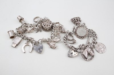 Lot 183 - TWO SILVER CHARM BRACELETS INCLUDING ANIMAL...