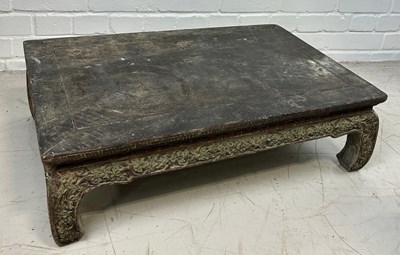 Lot 304 - CHINESE HEAVILY CARVED LOW TABLE IN THE MING...