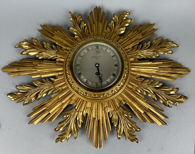 Lot 1042 - A GARRARD AND CO GILT WOOD SUNBURST WALL CLOCK