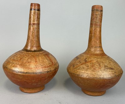 Lot 547A - A NEAR PAIR OF PRE-COLUMBIAN BOTTLE VASES,...