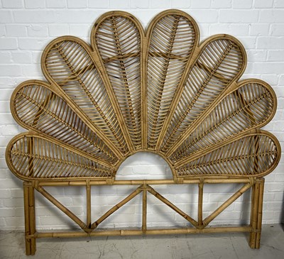 Lot 1048 - A DECORATIVE RATTAN HEADBOARD