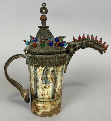 Lot 626 - A NORTH AFRICAN GLAZED CERAMIC COFFEE POT WITH...