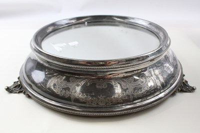 Lot 635 - AN ANTIQUE SILVER PLATED LARGE MIRRORED CAKE...